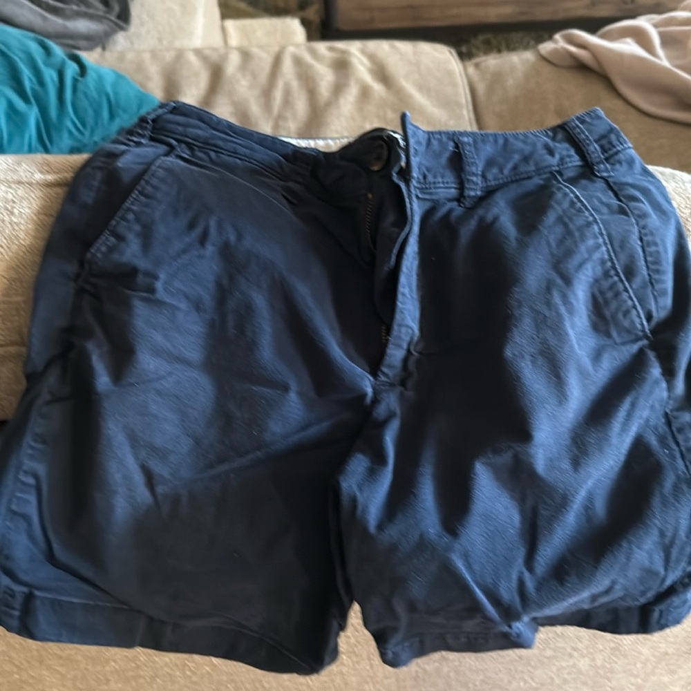 Navy flat front 7 inch size 29